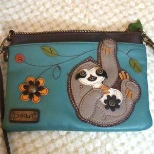 Purse Sleuth, leather stitch brown and teal.